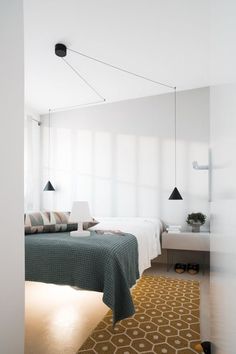 a bed room with two beds sitting next to each other