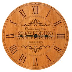 a wooden clock with the words celebrating our wedding anniversary written on it's face