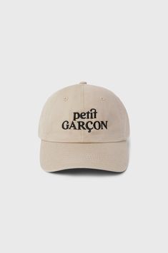 For the petit Garçons. the petit GARÇON baseball cap. As cute as it gets. A classic 6-panel construction made in 100% Cotton, this little cap is soft and comfy. Adorned with petit GARÇON luxe embroidery, we think this is an essential. An adjustable back strap allows for the perfect fit. Made in the USA100% CottonNote: this style is unisex Beige Baseball Cap With Letter Print And Curved Brim, Beige Baseball Cap With Letter Print, Beige Six-panel Baseball Cap With Embroidered Logo, Beige Embroidered Logo Six-panel Baseball Cap, Embroidered Logo Baseball Cap With Short Brim, Beige Six-panel Hat With Embroidered Logo, Kids Baseball Caps, Embroidery Caps, Kids Hat