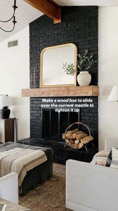 a living room filled with furniture and a fire place in front of a brick fireplace