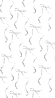 white streamers are flying in the air on a white background with space for text