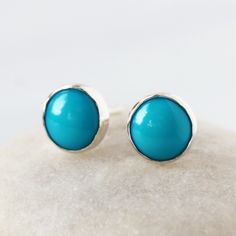 Sleeping Beauty Turquoise comes from the famous mine of the same name in Arizona, USA. This highly-regarded American turquoise is an intense, vivid color with little to no matrix on the surface. Set by hand entirely in sterling silver, these are the sweetest stud earrings, perfect for everyday. Turquoise is the December birthstone, the perfect gift for her. These boho stud earrings come with sterling silver wingnut backs, as pictured. The Sleeping Beauty Turquoise gems measure 6mm in size. All p Turquoise Jewelry Diy, Sleeping Beauty Turquoise Jewelry, Vintage Turquoise Jewelry, Handmade Turquoise Jewelry, Turquoise Jewelry Set, Jewelry Making Business, Silver Turquoise Jewelry, Turquoise Stud Earrings, Jewelry Photoshoot