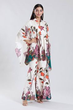 Off white asymmetric cape with floral pattern. Paired with a matching sharara. - Aza Fashions Cape Sharara, Asymmetric Cape, Sharara Set, White Chiffon, Set For Women, Cotton Silk, Aza Fashion, Pants Set, Floral Pattern