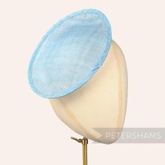 This oval scallop shape light blue sinamay fascinator base is made from a triple layer of stiffened sinamay millinery fabric and is ideal for making an instant hat! Get creative by positioning it at different angles on the head. Just add elastic, headband or comb for securing to the head (not included but available in our shop!) Measurements: Length: 19.5cm (7.6 inch) Width: 16.5cm (6.4 inches) Has a shallow 1.5cm deep curvature for resting on the head. For all you hat making needs visit our mil Adjustable Blue Sinamay Fascinator, Blue Adjustable Sinamay Fascinator, Blue Fitted Sinamay Fascinator, Adjustable Light Blue Fascinator For Royal Ascot, Blue Sinamay Hat For Summer, Sinamay Fabric, Sinamay Fascinator, Blank Hats, Sinamay Hats