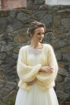 Hand knitted mohair fluffy cardigan with long sleeves. This sweater is the best decision for the cold weather in your wedding day 🌻 Cream Cardigan For Fall Wedding, Cream Wedding Cardigan For Fall, Elegant Knitted Sweater For Winter, Elegant Chunky Knit Sweater, Fall Wedding Cream Cardigan, Elegant Winter Wedding Cardigan, Elegant Mohair Sweater For Winter, Elegant Mohair Winter Sweater, Elegant Cream Chunky Knit Sweater