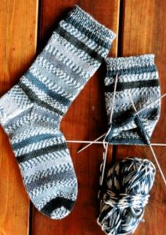 A pair of knitted socks on knitting needles Modern Knitting, Sock Knitting Patterns, Hand Crochet Baby Blanket, Learn How To Knit, Sport Weight Yarn, Crochet Needles, Dk Weight Yarn, Pattern Store, Circular Knitting Needles