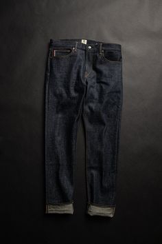 Straight Fit Indigo Raw 14oz What is denim weights? 96% COTTON / 4% POLYURETHANE 4-Way stretch Selvedge (Self-edge) Made in USA Model is 6'2" and wearing a size 32. Our premium denim is inspired by the classic vintage blue jean. Our Premium Japanese 4-Way Stretch Selvedge denim story starts in Japan where our fabric is developed at one of the oldest denim mills. We blend a unique 4 way stretch material with selvedge denim to create a specific amount of stretch and comfort you wouldn’t typically Dark Wash Selvedge Tapered Leg Jeans, Selvedge Denim Blue Jeans For Streetwear, Dark Wash Selvedge Jeans With Straight Hem, Selvedge Straight Leg Dark Wash Jeans, Selvedge Denim Jeans With Tapered Leg, Selvedge Recycled Denim Tapered Leg Jeans, Indigo Rigid Denim Jeans For Streetwear, Selvedge Jeans For Everyday, Dark Wash Selvedge Rigid Denim Jeans