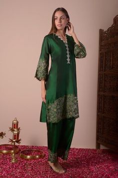 Emerald green kurta with floral cutwork embroidered border. Paired with palazzo. - Aza Fashions Green Silk Set With Floral Embroidery, Semi-stitched Green Palazzo Set With Floral Embroidery, Elegant Green Kurta With Floral Embroidery, Green Silk Lawn Suit For Navratri, Festive Green Lawn Suit With Cutdana, Elegant Green Sets With Floral Embroidery, Elegant Festive Traditional Wear With Cutwork, Festive Palazzo Set With Cutwork And Straight Kurta, Festive Chanderi Cutwork Sets