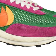 Nike x Sacai 'LD Waffle' low-top sneaker in beige suede with fuchsia pink, green, and yellow, white, and orange detailing. Features a see-through nylon upper, fuchsia pink leather heel with green logo, double logo swoosh, double flat laces in white, a double tongue, and white and black rubber sole. Includes box. Brand = Nike x Sacai Condition = 7/10, Good, discolouration to suede, rubber midsole, tongue, and laces Size = Men's 10.5 US Material = Nylon/Suede SKU = 3652-63 Green Low-top Sneakers With Vibram Sole, Green Sporty Custom Sneakers With Vibram Sole, Sporty Green Custom Sneakers With Vibram Sole, Pink Low-top Running Shoes With Vibram Sole, Green Running Shoes With Contrast Sole, Retro Green Sneakers With Laces, Pink Low-top Sneakers With Vibram Sole, Pink Running Sneakers With Vibram Sole, Green Custom Lace-up Sneakers With Vibram Sole