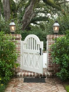 the instagram page on instagram com shows an image of a white gate and brick wall