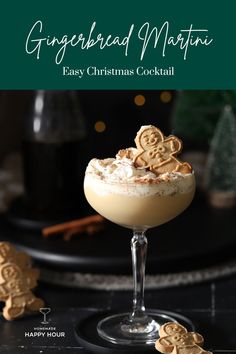 an easy christmas cocktail is garnished with gingerbreads and marshmallows