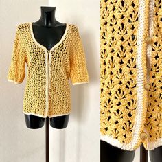 "Crochet Yellow Hole Blouse Short Sleeve Button up Jacket Vintage Knit Cardigan Gift For Mum Bohemian Top Vest Beach Cover up Tunic Size M/L ♥ 6 golden button up closure ♥ Halv sleeve Vintage condition : Excellent Tag: No Tags. Materials: No Tags  Size: No Tags ( Fits on S-L ) - to be Sure - please take your personal measurements and compare with Jacket : Measurements: Length: 68cm = 26,8\" Bust : max : 110cm = 43,3\" Waist: max : 108cm = 42,5\" Sleeves: 30cm = 11,8'' Shoulder  to shoulder : 50cm = 19,7 Additional Notes: Please note that due to the nature of vintage clothing, ALL ITEMS ARE SOLD AS-IS; with no returns or exchanges, regardless of fit or condition. We try our best to give as much measurements as possible, note each minor issue on the clothing and price accordingly. Should you Bohemian Button-up Summer Outerwear, Bohemian Summer Button-up Outerwear, Summer Button-up Sweater With Buttons, Beige Buttoned Summer Cardigan, Yellow Spring Cardigan For The Beach, Beige Summer Cardigan With Buttons, Beige Buttoned Cardigan For Summer, Summer Beige Cardigan With Buttons, Yellow Cardigan For Spring Beach Occasion