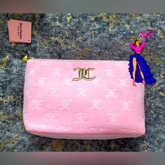 Pink Soft Velour 13”L X 8”H X 4.5”D Includes Small Mini Travel Bottle Gold-Tone Metal Hardware Gold-Tone Logo Zipper Pull #Fashion #Beauty #Pinkdiva #Fashionista #Bossbabe #Cosmetic #Beautybag #Velvet #Girly #Sparkle #Statement #Bling #Diamondsareagirlsbestfriend Chic Pink Shoulder Bag With Zipper Pouch, Luxury Pink Bag With Zipper Pouch, Luxury Pink Cosmetic Bag For Everyday Use, Luxury Pink Rectangular Cosmetic Bag, Juicy Couture Makeup Bag, Juicy Couture Daydreamer Bag, Pink And Brown Juicy Couture Bag, Juicy Couture Bags Vintage, Juicy Couture Daydreamer Bag Pink