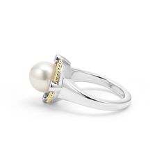 A freshwater cultured pearl surrounded by sterling silver, diamonds, and 18K gold. LAGOS diamonds are the highest quality natural stone. Pearl Diamond Ring, Pearl And Diamond Ring, Pearl Diamond, Engraved Items, Ring Size Guide, Silver Diamonds, Fresh Water, Natural Stone, Natural Stones