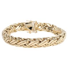 Tiffany & Co 18 Karat Yellow Gold Woven Wheat Bracelet 7.5 Inch Length 5.3mm Height 9.5mm Wide Stamped Tiffany & Co 750 35.1 Grams Tiffany And Co Bracelet Gold, Gold Tiffany Bracelet, Tiffany Gold Bracelet, Tiffany Bracelet Gold, Jewelry Bracelets Gold Tiffany & Co., Cuff Bracelets Gold Tiffany & Co., Tiffany And Co Bracelet, Tiffany Diamond, Retro Bracelet