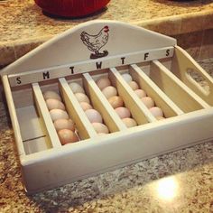 an egg tray with several eggs in it