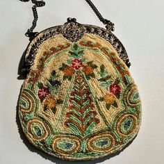 This Delicately Beautiful Hand Beaded Bag Is From The Brand Christiana Made In The 90s. It's In Like New Condition. Lined With Silk And Including An Attached Mirror This Bag Will Compliment A Simple Outfit And Accentuate Some Look More Complex. 8 X 7 Inch Chain Shoulder Strap Filigree Hardware Bead Embroidery Bag, Traditional Everyday Beaded Bags, Traditional Brown Beaded Bag, Elegant Multicolor Beaded Bag, Vintage Beaded Purse, Embroidery 101, Mary Frances Handbags, Antique Beaded Purse, Hand Beaded Bag