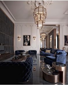 a living room filled with furniture and a chandelier