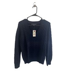 Tommy Hilfiger Navy Blue Cable Knit V-Neck Long Sleeve Medium Sweater Brand: Tommy Hilfiger Size: Medium Color: Navy Blue Condition: Great. Chatgpt Tommy Hilfiger Navy Blue Sweater Cable Knit V-Neck Long Sleeve Size Medium Classic Style Preppy Fashion Winter Wardrobe Timeless Design Signature Branding Comfortable Fit Casual Elegance Versatile Apparel Everyday Chic Midweight Sweater Stylish Layering Cold Weather Fashion Contemporary Knitwear Tommy Hilfiger Logo Layering Cold Weather, Casual Navy Tommy Hilfiger Top, Tommy Hilfiger Knit Sweater, Tommy Hilfiger Navy Winter Tops, Tommy Hilfiger V Neck Sweater, Polka Dot Vest, Tommy Hilfiger Blue Relaxed Fit Top, Preppy Style Winter, White Faux Fur Vest