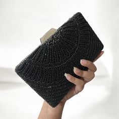 Introducing our exquisite Handmade Crystal Evening Clutch, a dazzling accessory fit for a bride's special day! 🌟 Handcrafted Elegance: Each clutch is meticulously handmade by skilled artisans, ensuring the utmost attention to detail and quality. ✨ Sparkling Crystals: Adorned with shimmering crystals that catch the light with every movement, this clutch adds a touch of glamour to your bridal ensemble. 👛 Perfect Size: With a roomy interior to hold your essentials - from keys, makeup to your phon Elegant Beaded Bridal Accessories For Party, Black Beaded Evening Bag For Wedding, Elegant Beaded Bridal Accessories, Elegant Beaded Bridal Accessories For Evening, Silver Embellished Bridal Accessories For Evening, Silver Beaded Bridal Accessories For Party, Elegant Silver Bridal Accessories For Evening, Elegant Embellished Bridal Accessories, Elegant Embellished Bridal Accessories For Formal Occasions