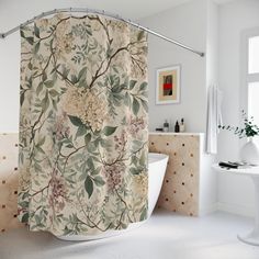 a bath room with a toilet and a shower curtain on the wall next to a tub