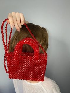 Aesthetic tote bag for woman. Vintage pearl beaded red retro bag that will decorate your Valentine's day.  🔥PROCESSING TIME 3-4 days MATERIAL: Crystal red beads 8mm. With every pearl bag you'll get GIFT 🎁 In addition to the gift, a hand-signed POSTCARD with a message from the purse is attached to the order✉ If this is a present, be sure to write me the name of the recipient✒ More pearl bags: https://www.etsy.com/shop/VitakaJewelry?ref=seller-platform-mcnav&section_id=29560344 Please be aware that some countries impose customs fees and taxes for packages that enter your country.  These fees are kept by your government and outside of your purchase with me. *If you are running out of time, use FAST DELIVERY. Write me directly please. Trendy Handheld Evening Bag As Gift, Trendy Handheld Box Bag Gift, Trendy Shoulder Bag With Pearl Handle As Gift, Trendy Top Handle Evening Bag As Gift, Large Capacity Evening Shoulder Bag As Gift, Trendy Double Handle Box Bag For Gift, Trendy Double Handle Box Bag Gift, Large Capacity Shoulder Evening Bag As Gift, Large Capacity Shoulder Evening Bag