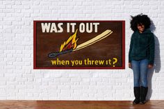 a woman standing in front of a sign that says was it out when you threw it?