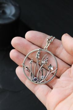 ITEM DESCRIPTION: The size H 4 cm x W 4 cm (1 2/3 x 1 2/3 inch). Weight - 5 g. You can buy it with a silver chain or without it. I made these pretty garden flowers of sterling silver, iolite, and blue topaz. Muscari is a really lovely delicate spring flower. And this floral jewelry will be a great addition to your jewelry collection or gift for someone whose you love. I can make this with other stones, just write to me - I'm always open to custom orders. This handmade necklace will come to you i Silver Nature-inspired Round Pendant Jewelry, Nature-inspired Jewelry With Large Round Pendant, Silver Round Pendant Jewelry With Nature-inspired Style, Silver Circle Gemstone Jewelry, Silver Circle Jewelry With Birthstone, Jewellery Project, Plant Necklace, Jewelry Hacks, Woodland Earrings