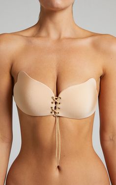 Give your girls that extra lift with the Push Up Stick on Bra! This godsend has a wing-like design and features a lace up front with a toggle. It's completely strapless and backless, making it perfect for those strapless and backless, dresses, tops and beyond. Make it your go-to for those days or nights out, and you'll be dancing away hassle free!Product Details  Self-adhesive on inner side of cups  Adjustable toggle fastening on the front  Wing-like design  Strapless  BacklessPlease note: we re Fly Bra, Stick On Bra, Backless Dresses, Silicone Bra, The Push, Backless Bra, Nude Bra, Adhesive Bra, Free Product