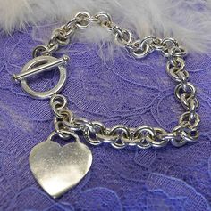 (eBay) Engravable Heart 7 1/2" Chain 0.925 Sterling Silver Estate Bracelet with Toggle Classic Silver Charm Bracelet For Valentine's Day, Classic Silver Heart Bracelet With Lobster Clasp, Silver Heart-shaped Bracelet With Toggle Clasp, Silver Heart Bracelet With Toggle Clasp, Sterling Silver Heart Necklace, Vintage Tiffany, Heart Chain, Vintage Bracelet, Silver Heart Necklace