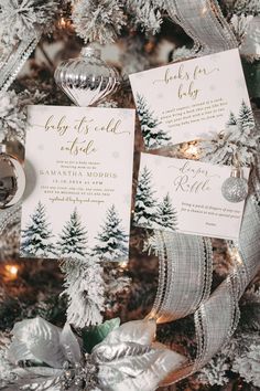 christmas tree with silver ribbon and white snowflakes