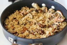 a pan filled with food sitting on top of a stove