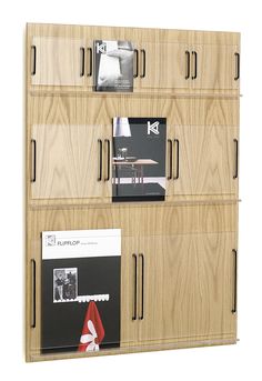 a wooden bookcase with several compartments and papers