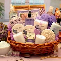 a basket filled with lots of different types of soaps and lotions on top of a table