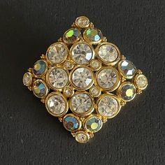 Wowza!! This Vintage Brooch Is A Showstopper!! Unused Old Stock And In Mint Condition. Features Clear Rhinestones, Pale Blue Ab Rhinestones, Faux Pearls, And Goldtone. Wear On Jacket, Dress, Sweater, Top, Hat, Bag, In Hair, As Boutonnire, And More. Perfect Gift For Collectors. Gifts. Collectible. Bridal. Formal. Bridesmaids. Prom. Neutral. Bling. Rhinestones. Coastal Cowgirl. Classic. Pearls. From Smoke Free Dog Friendly Home. Bling Rhinestones, Hat Bag, Dress Sweater, Coastal Cowgirl, Pearl Brooch, Dog Friendly Home, Vintage Brooch, Vintage Rhinestone, Top Hat