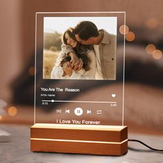 a wooden block with an image of a couple on it