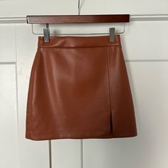 Faux Leather Skirt From Aritzia. Never Worn. Has A Little Slit On The Left Leg. Faux Leather Mini Skirt, Leather Mini Skirt, Aritzia Wilfred, Faux Leather Skirt, Leather Mini Skirts, Leather Mini, Teen Wolf, Leather Skirt, Mini Skirt