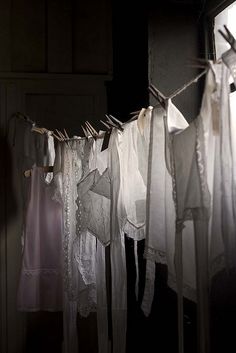 clothes hanging on a line in the dark