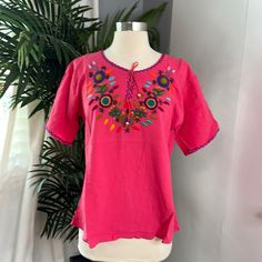 Unique Tops No Body Is Having The Same Top Is Hand Made Embroidery In Guatemala 100% Cotton Organic Everything Comes From Nature. Tag Said Large But In Guatemala The Sizing Is Different If It Said Large Is One Size Less Medium And You Can See The Measurements In The Pictures. Thank You For Visiting My Closet And Sharing!! Pink Short Sleeve Top With Machine Embroidery, Beach Embroidered Pink Tops, Pink Embroidered Beach Top, Casual Pink Embroidered Top With Floral Design, Pink Short Sleeve Embroidered Cotton Top, Casual Pink Top With Floral Embroidery, Casual Pink Floral Embroidered Top, Pink Folk Style Tops With Floral Embroidery, Beach Tops With Embroidered Border