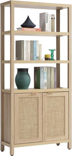 a book shelf with books and vases on top of it in front of a white background