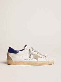 Men's Super-Star with suede star and blue heel tab | Golden Goose Golden Goose Men Sneakers, Navy Golden Goose, Mens Golden Goose, Blue Golden Goose, Golden Goose Men, Golden Goose Sneakers Outfit, Man Sneakers, Golden Family, Blue Suede Heels