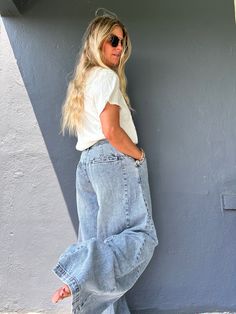 Introducing our Step Up wide leg trouser jeans - the perfect combination of style and comfort. These low rise jeans feature a wide leg trouser style made of 100% cotton for a breathable and comfortable fit. Elevate your denim game with these versatile and trendy jeans! Dark Wash Denim Wide Leg Flares, Trendy Wide Leg Flares In Medium Wash, Casual High Rise Denim Flares, Casual Dark Wash Denim Flares, Relaxed Fit Wide-leg Flare Jeans, Trendy Medium Wash Cotton Flares, Summer Full Length Denim Flares, Trendy Baggy Denim Blue Flare Jeans, Summer Full-length Denim Flares