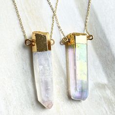 "Listing is for one Angel Aura crystal quartz Point Pendant Connector Stone Size: approx. 13-15mm x 47-55mm Can choose just pendant or pendant with chain necklace Drill Hole: drilled STOCK PHOTOS-- Pendants will vary slightly as to the shape and size of crystal Quartz, making each ring unique. Quartz is a power stone. It has been called the \"Universal Crystal\" because of its many uses. It enhances energy by absorbing, storing, amplifying, balancing, focusing and transmitting." Mystical Gold Crystal Necklaces With Gemstone, Mystical Gold Gemstone Crystal Necklaces, Iridescent Pendant Crystal Necklace For Healing, Gold Spiritual Crystal Necklace, Iridescent Crystal Gemstone Necklaces For Spiritual Use, Spiritual Iridescent Crystal Necklace With Gemstone, Iridescent Spiritual Gemstone Crystal Necklace, Iridescent Gemstone Crystal Necklace For Spiritual Use, Iridescent Gemstone Pendant Crystal Necklace