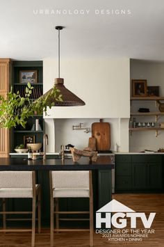 an image of a kitchen setting with green cabinets and wood flooring in the background