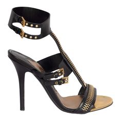 Embellished with golden zipper, buckles, and eyelets, the Tom Ford Zipper T-Strap Sandals is a rare piece that elevates the simplest looks and adds peak '80s glamor to your extraordinary ensemble. Insole Length - 25 cm Heel - 10 cm Old Fashioned Words, Tom Ford Shoes, T Strap Sandals, Stiletto Pumps, Shoe Closet, T Strap, Vintage Shoes, Shoes Black, Strap Sandals