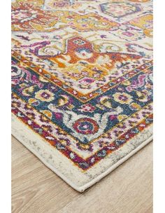 an area rug with various colors and patterns