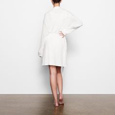 Perfect for lounging and layering over sleepwear, the Soft Lounge Robe is composed of super-soft modal ribbed fabric that drapes effortlessly in all the right places. This short robe features an adjustable self-tie belt and functional side pocket at inseam. | SKIMS Robe | White | Soft Lounge Lounge Robes, Rib Fabric, Size 16 Dresses, Adjustable Belt, Ribbed Fabric, Tie Belt, Side Pocket, Size 16, Layering