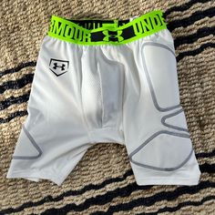 Under Armour Boys Performance Shorts With Built In Protective Cup. Size Small. Nwot. Smoke Free/Pet Free Home. Never Worn. White Shorts With Built-in Shorts For Playwear, White Shorts With Elastic Waistband For Playwear, White Elastic Waistband Shorts For Playwear, Sporty White Pants With Built-in Shorts, White Short Sports Pants, Casual White Pants For Playwear, Under Armour White Casual Shorts, Under Armour Casual White Shorts, Casual White Under Armour Shorts