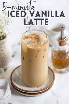 an iced vanilla latte on a plate with the text 5 minute iced vanilla latte