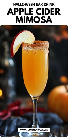 an apple cider mimosa is garnished with cinnamon and topped with an apple